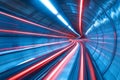 A high-tech neon tunnel with blue and red glowing lines crossing over each other, creating a