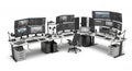 High-Tech Workstation Setup Featuring Multiple Monitors Keyboards and Desktops Arranged on White Tables Creating an Royalty Free Stock Photo