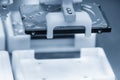 The high technology material handling process the computer parts by robotic system in the light blue scene