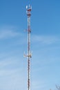 High telecommunications tower with antennas for mobile phones creating radio cells Royalty Free Stock Photo