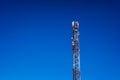 High telecommunications tower, with antennas for mobile phones creating radio cells, copy space Royalty Free Stock Photo