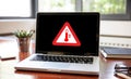 High temperature warning sign on a laptop screen.  Computer overheat, overload, hot weather danger Royalty Free Stock Photo