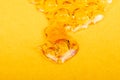 high thc, cannabis wax marijuana concentrate on yellow background macro