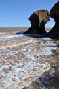 High tide coming in at Hopewell Rocks along the Bay of Fundy Royalty Free Stock Photo