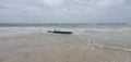 Stranded boat at high tide at Honeymoon Island, Florida