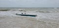 Stranded boat at high tide at Honeymoon Island, Florida