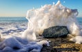 High tide wave smashing on rocks