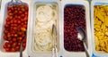 High top view of salad bar with many of assortment of ingredients such as tomato, corn, red bean in the white bowl Royalty Free Stock Photo