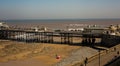 A high up view of the sea front promenade and first part of Cromer pier, Norfolk. UK weather: A bright and sunny, but breezy day,