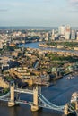 A high vantage view of London Bridge in the foreground and the East of London and River Thames.