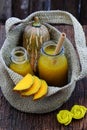 Butternut squash milk bottle, yellow healthy, nutritious drink for breakfast Royalty Free Stock Photo