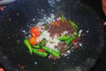 A high view of cayenne pepper, tomatoes, salt, shrimp paste and concoction spices