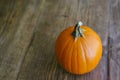 High View of Sugar Pumpkin on Farm Table