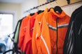 high-visibility jackets on a rack for cyclists Royalty Free Stock Photo