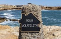 High volatility symbol. Concept words High volatility on beautiful black chalk blackboard. Chalkboard. Beautiful stone sea sky