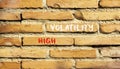 High volatility symbol. Concept words High volatility on beautiful brick wall. Beautiful red brown brick wall background. Business