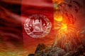 big volcano eruption at night with explosion on Afghanistan flag background, suffer from eruption and volcanic ash concept - 3D Royalty Free Stock Photo