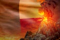 high volcano eruption at night with explosion on Benin flag background, problems of disaster and volcanic ash concept - 3D