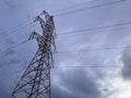 High voltage cable tower with cloudy sky Royalty Free Stock Photo