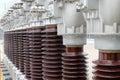 High voltage ceramic isolators arranged in a row Royalty Free Stock Photo