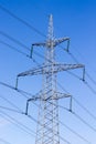 High-voltage electric main against the dark blue sky Royalty Free Stock Photo