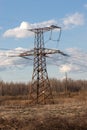 High-voltage electric main against the dark blue sky Royalty Free Stock Photo