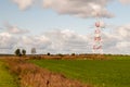 High-voltage electric main against the dark blue sky in summer day Royalty Free Stock Photo