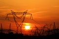 High voltage electric pole during sunset Royalty Free Stock Photo