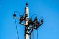 High voltage electric pole and transmission lines with clear blue sky. Electricity pylons. Power and energy engineering system. Da Royalty Free Stock Photo