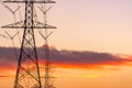 High voltage electric pole and transmission lines in the evening. Electricity pylons at sunset. Power and energy. Energy Royalty Free Stock Photo