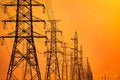 High voltage electric pole and transmission lines in the evening. Electricity pylons at sunset. Power and energy. Energy Royalty Free Stock Photo