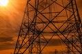 High voltage electric pole and transmission lines in the evening. Electricity pylons at sunset. Power and energy. Energy Royalty Free Stock Photo