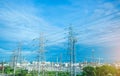 High voltage electric tower line. Silhouette of Power Supply Facilities with blue sky background