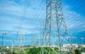 High voltage electric tower line. Silhouette of Power Supply Facilities with blue sky background