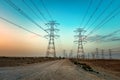 High Voltage an electric tower in sunset time near Al Hofuf Desert - Saudi Arabia Royalty Free Stock Photo