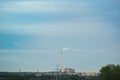 High voltage electric transmission pylon silhouetted. Electricity transmission pylon silhouetted against blue sky. High voltage Royalty Free Stock Photo