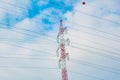 High voltage electric transmission pylon silhouetted. Electricity transmission pylon silhouetted against blue sky. High voltage Royalty Free Stock Photo