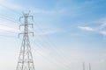 High Voltage Electric Transmission Tower Energy Pylon against Royalty Free Stock Photo