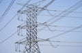 High voltage electric transmission tower. High voltage power lines against the sky. Electricity pylon and electric power Royalty Free Stock Photo