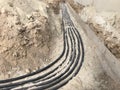 The high voltage electrical cable is laid in a trench Royalty Free Stock Photo