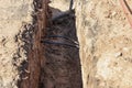 The high voltage electrical cable is laid in a trench Royalty Free Stock Photo