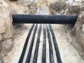 The high voltage electrical cable is laid in a trench Royalty Free Stock Photo
