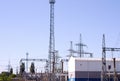 High voltage electrical substation with transformers and electric towers. Royalty Free Stock Photo