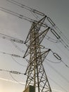 High voltage electrical tower with blue sky background Royalty Free Stock Photo