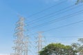 High voltage electrical tower blue sky background. Royalty Free Stock Photo