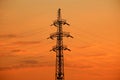 High voltage electricity line in Ukraine On Sunset. Concept of Russian missile attack on Ukrainian energy, war. Blackout, saving