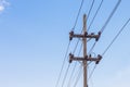 High voltage electricity pole with blue sky background Royalty Free Stock Photo