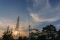 high voltage electricity post with sunset background Royalty Free Stock Photo