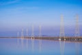 High voltage electricity power lines and transmission towers Royalty Free Stock Photo