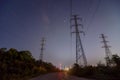 High voltage electricity pylon at night Royalty Free Stock Photo